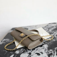 CC Calfskin Lizard Embossed Clutch