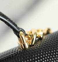 CC Calfskin Lizard Embossed Clutch