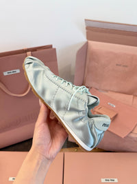 MIU M Plume Sneakers