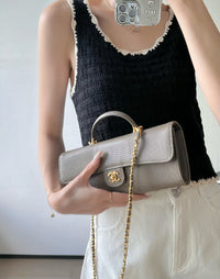 CC Calfskin Lizard Embossed Clutch
