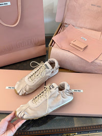 MIU M Plume Sneakers