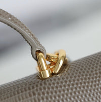 CC Calfskin Lizard Embossed Clutch