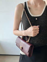 CC Calfskin Lizard Embossed Clutch