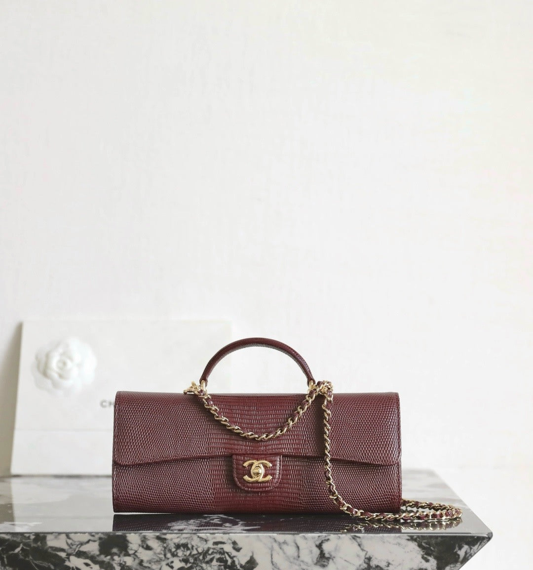 CC Calfskin Lizard Embossed Clutch