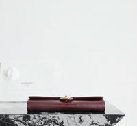 CC Calfskin Lizard Embossed Clutch