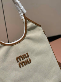 MIU M Ivy Canvas Leather Bag