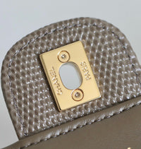 CC Calfskin Lizard Embossed Clutch