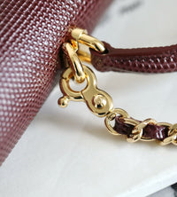 CC Calfskin Lizard Embossed Clutch