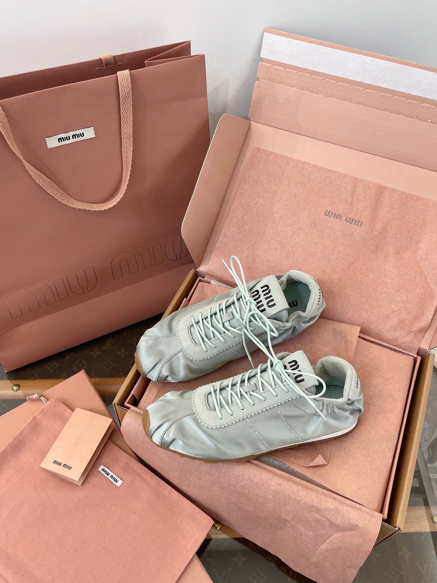 MIU M Plume Sneakers