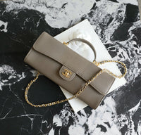 CC Calfskin Lizard Embossed Clutch
