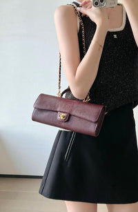 CC Calfskin Lizard Embossed Clutch