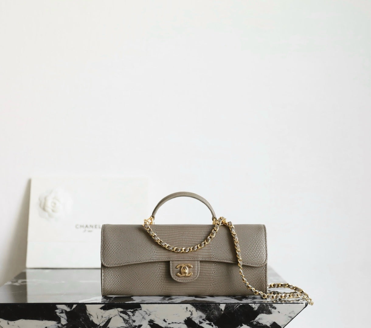 CC Calfskin Lizard Embossed Clutch